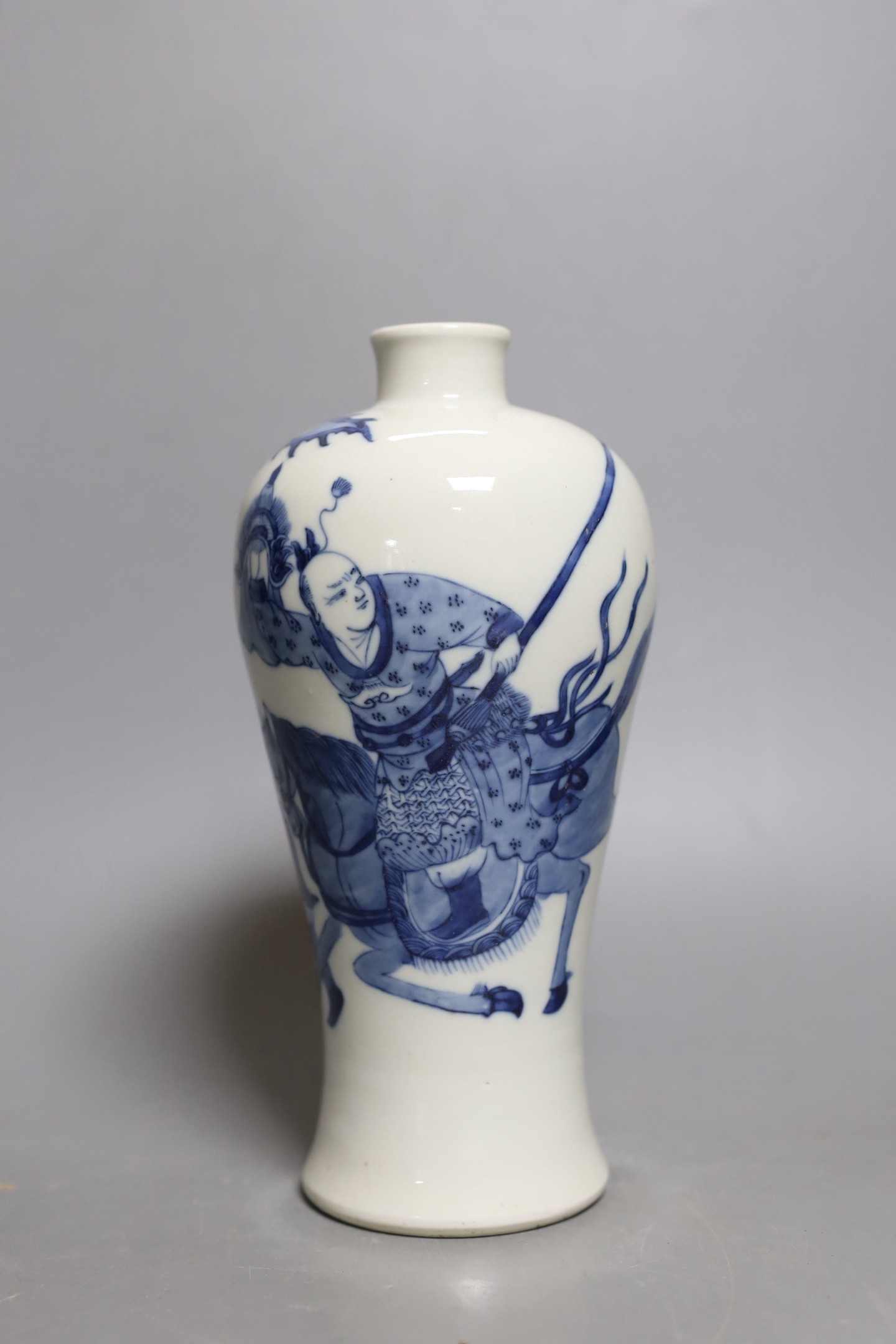 A Chinese blue and white baluster ‘warrior’ vase. 22cm tall